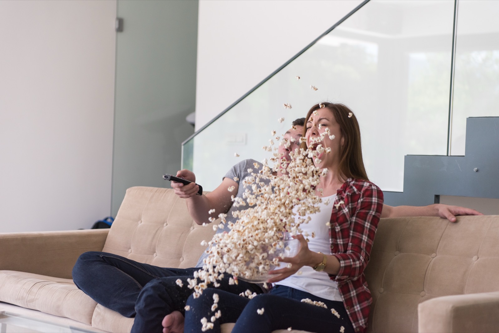 A couple watching a movie on Prime Video at home